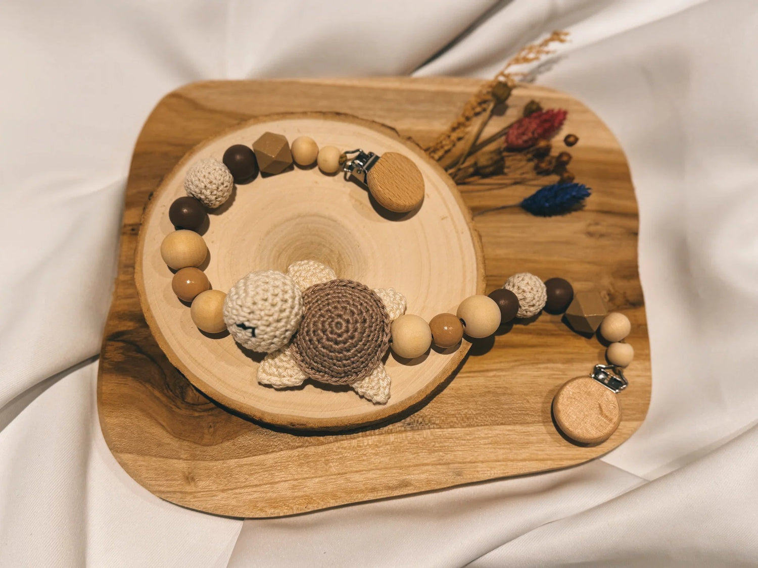 Kinderwagenkette mit gehäkelter Schildkröte und Holzperlen