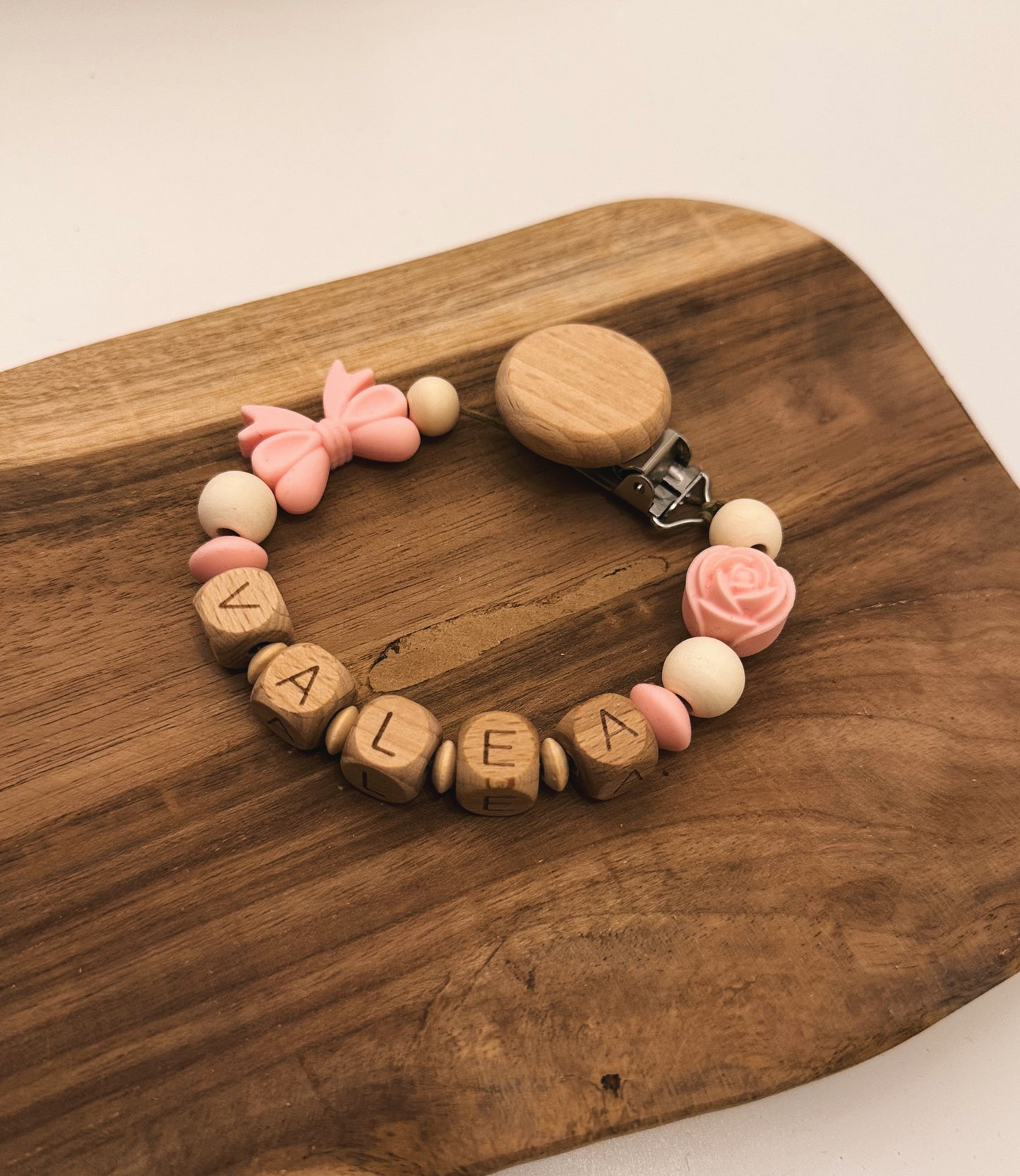 Catenella portaciuccio personalizzabile con nome | Rosa | Fiocco