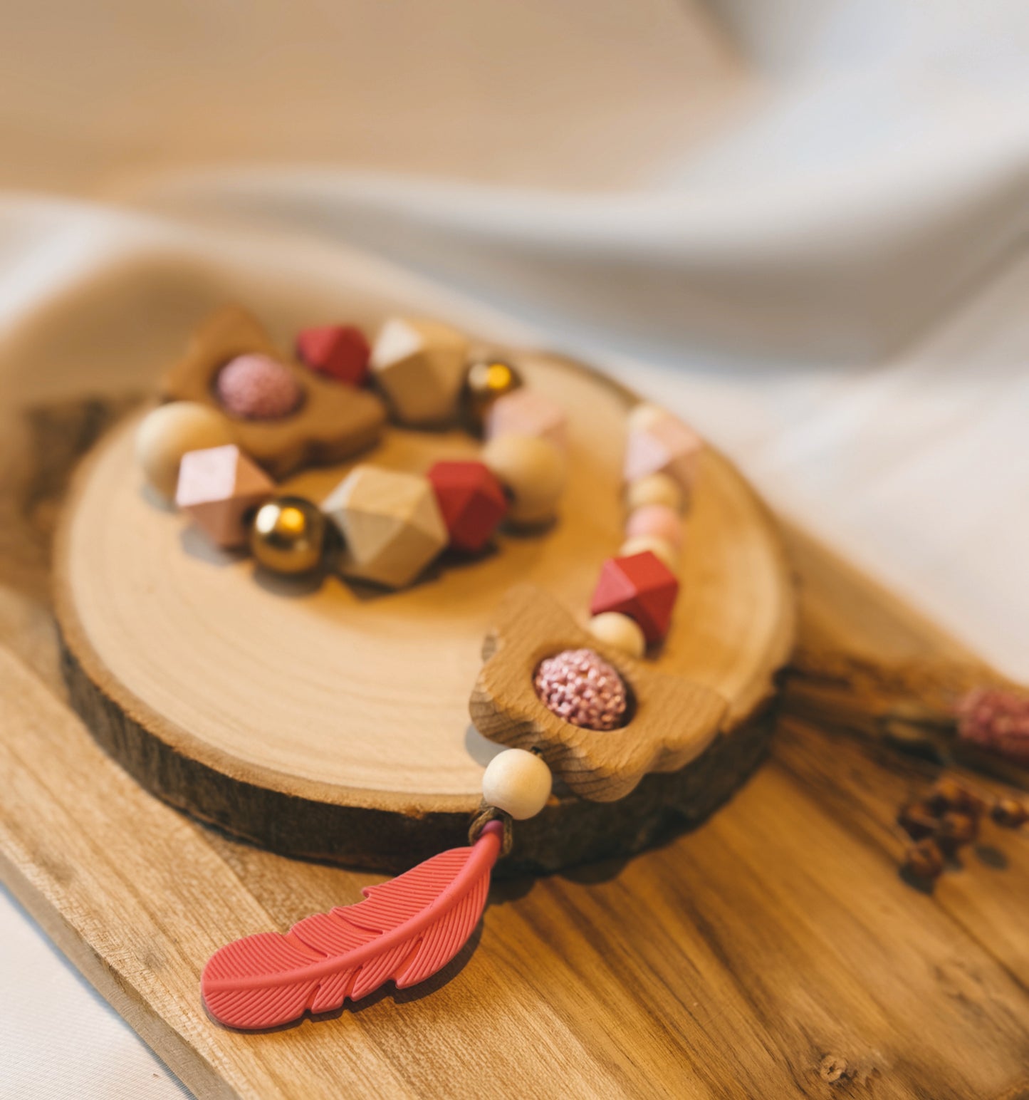 Greifring und Anhänger für Babyschale / Spielbogen | aus Holz | Schmetterling | Glocke | Feder