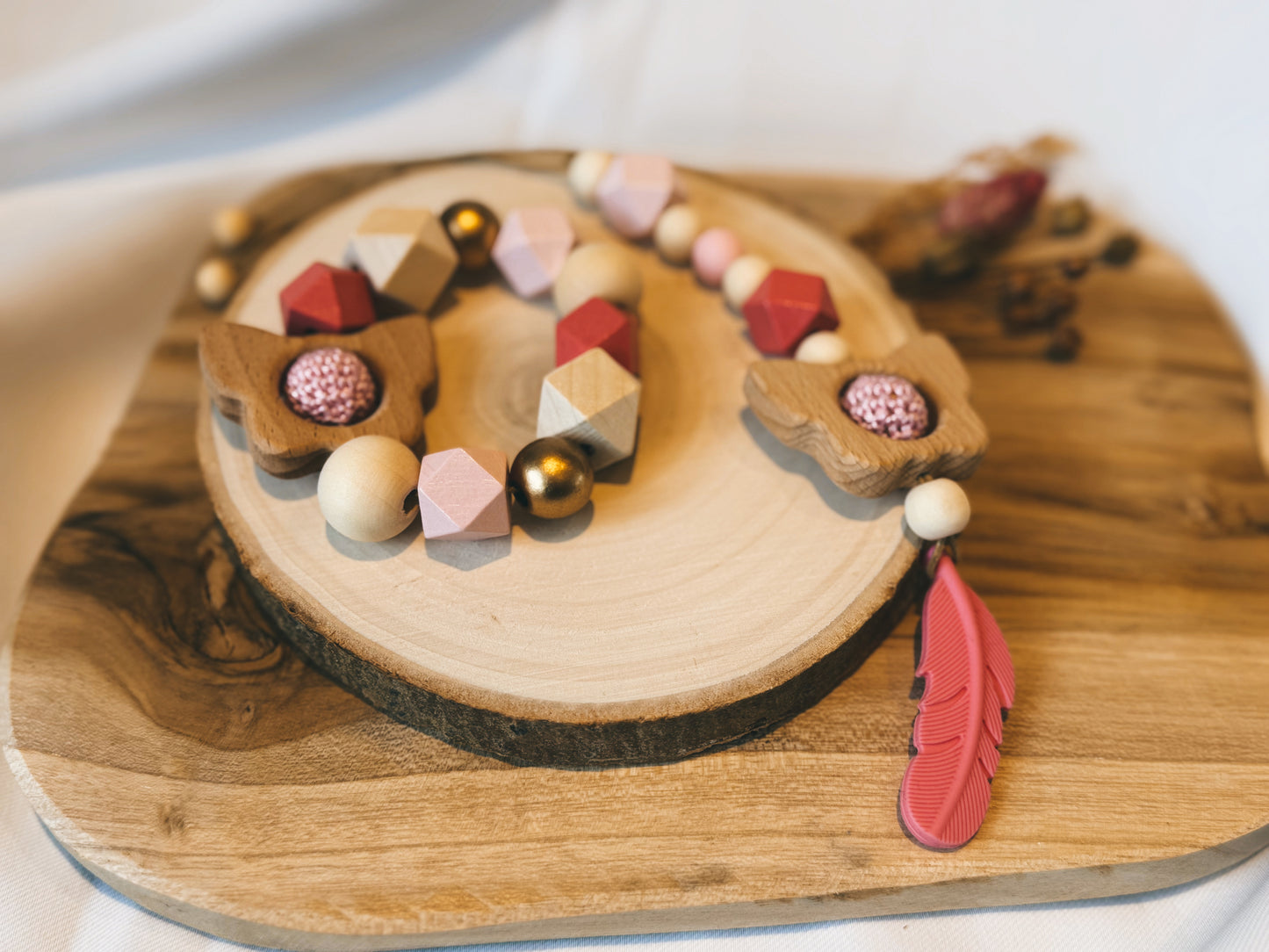 Greifring und Anhänger für Babyschale / Spielbogen | aus Holz | Schmetterling | Glocke | Feder