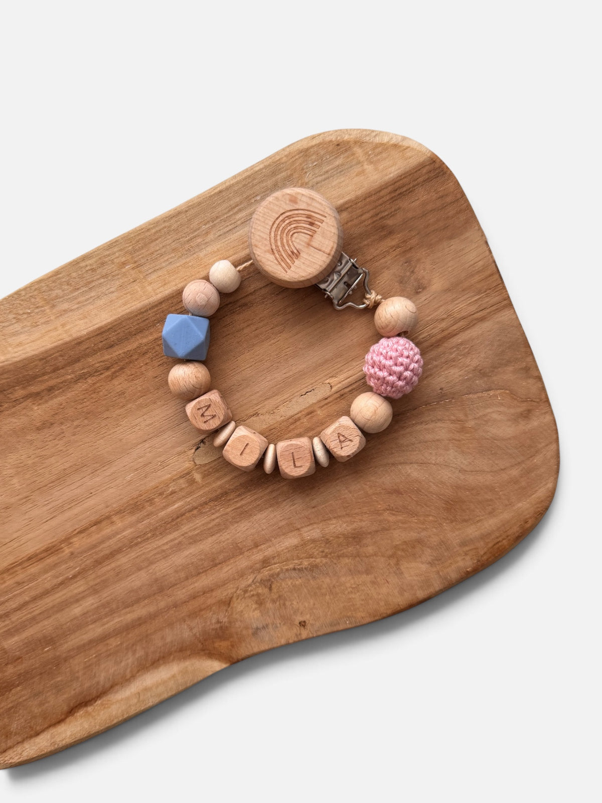 Regenbogenglück - Kinderwagenkette, Greifring & Schnullerkette | Regenbogen | aus Holzperlen | gehäkelt | rosa/blau/türkis | mit Namen personalisierbar