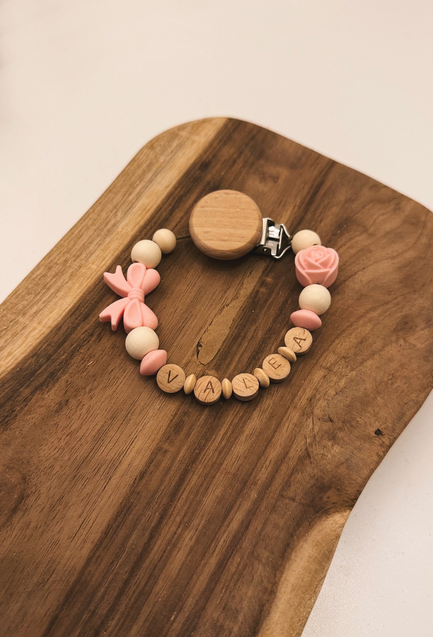 Catenella portaciuccio personalizzabile con nome | Rosa | Fiocco
