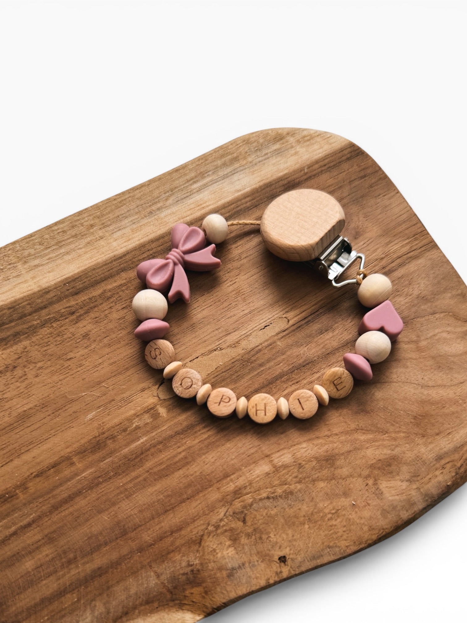 Schnullerkette Schleife und Herz mit Namen personalisierbar Geschenk zur Taufe oder Geburt Mädchen Baby mit Silikonring rosa Rose Blush Holzperlen 