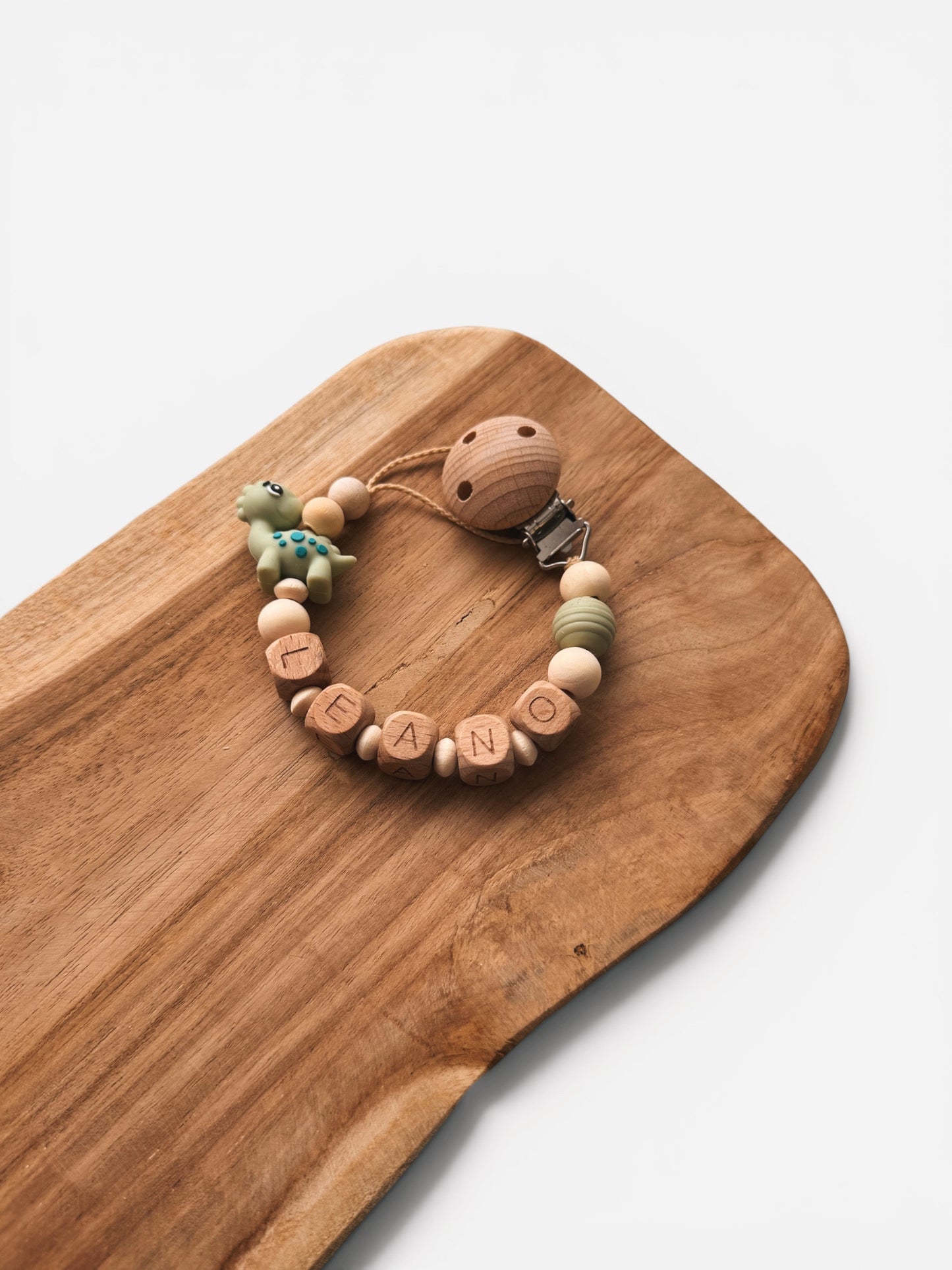 Dinoabenteuer - Anhänger für Spielbogen oder Babyschale & Schnullerkette mit Namen personalisierbar | Dinosaurier | Grün