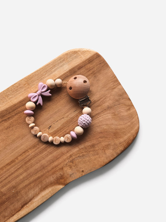Schnullerkette Schleife mit Namen personalisierbar | Flieder/Lila